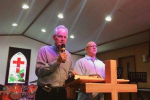 Nils interprets for Jeff Earlwyine in Japan at Munakata Bethel Christian Center on November 20, 2016, one week after Nilw & Andrea passed the baton of pastoral leadership to Jim & Tracy Xavier.